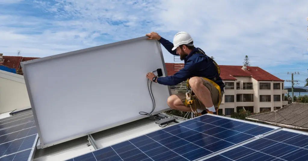 man testing solar panels 1