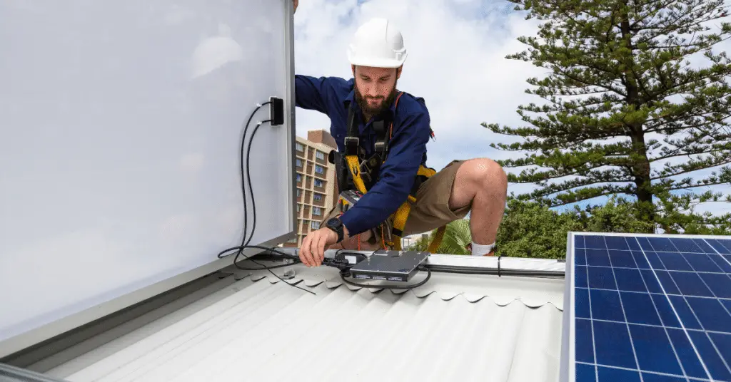 man testing solar panels 2