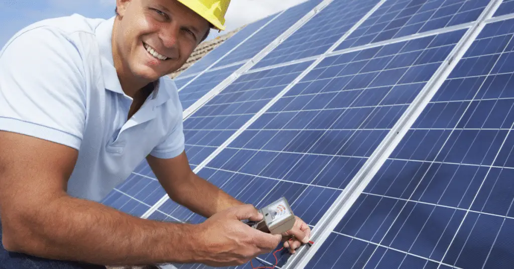 man testing solar panels 3