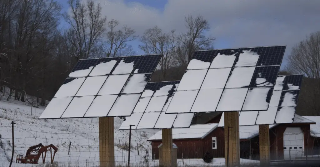 Photo of solar panels covered with snow