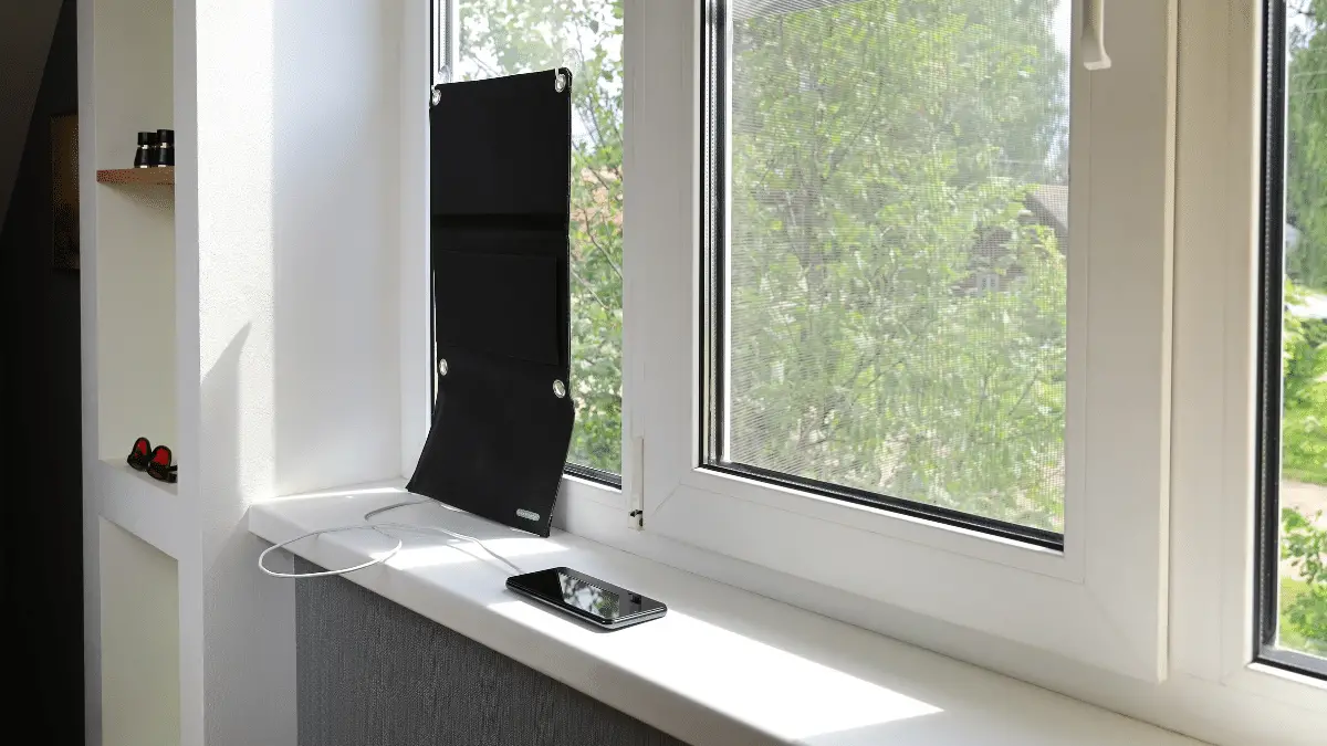 Portable solar panel on the window