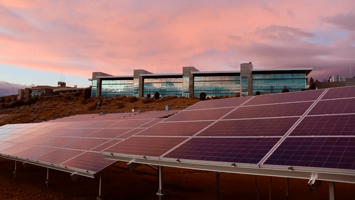 Solar energy panels near a modern building