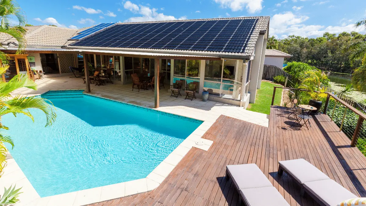 Solar panels by swimming pool