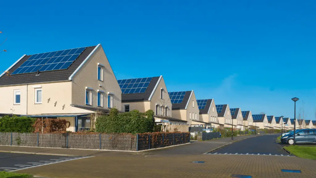 A row of houses with photovoltaic cells