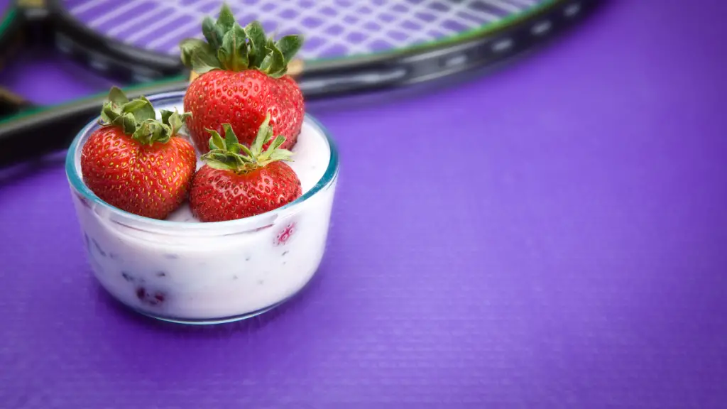 Tennis racket and strawberries