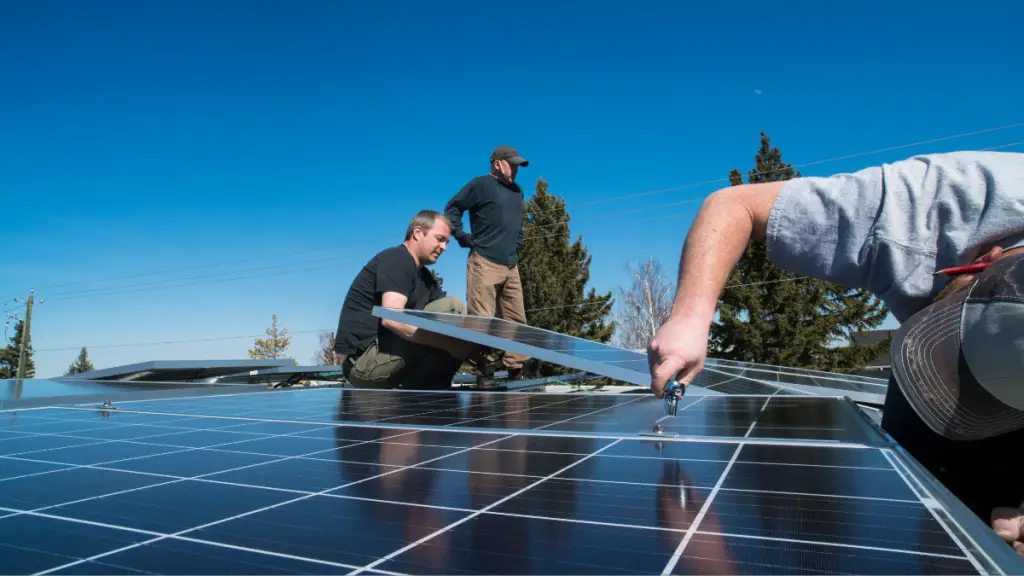 engineers installing solar panels